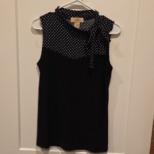 Elegant Black Sleeveless Blouse with Polka Dots